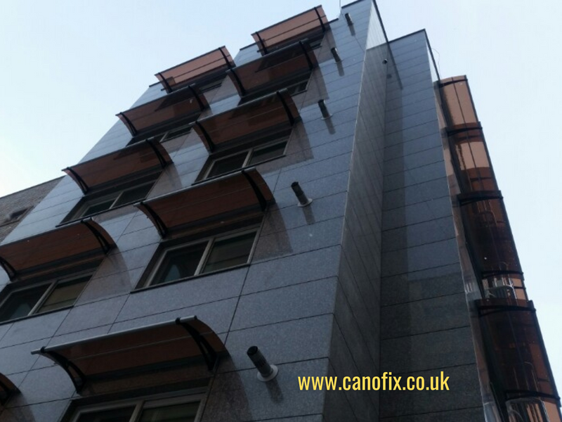 CANOFIX canopies installed throughout the building changed the exterior of the building.